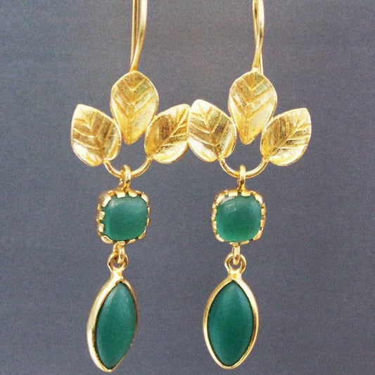 Gold-coloured copper drop earrings with water droplet shape, French leaves pattern, and zircon accents on retro design