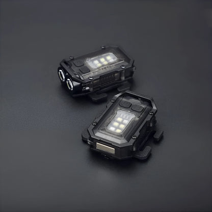 Compact black rechargeable tactical flashlight with USB charging cable for backpack mounting.