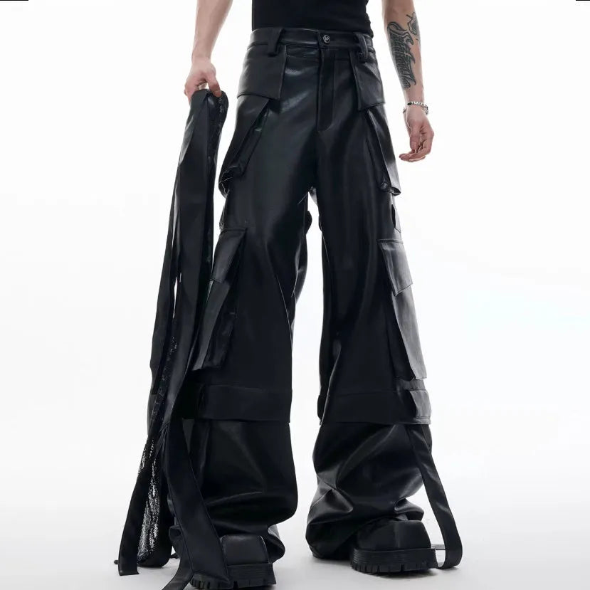 Black loose-fit trousers with quilted texture, multiple pockets, and stitching ribbon leather accents on model