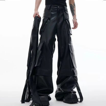 Black loose-fit trousers with quilted texture, multiple pockets, and stitching ribbon leather accents on model