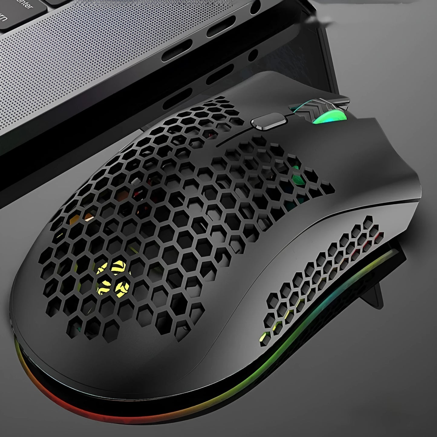 BM600 wireless luminous mouse with hollow out design in black, cyan, or white colour.