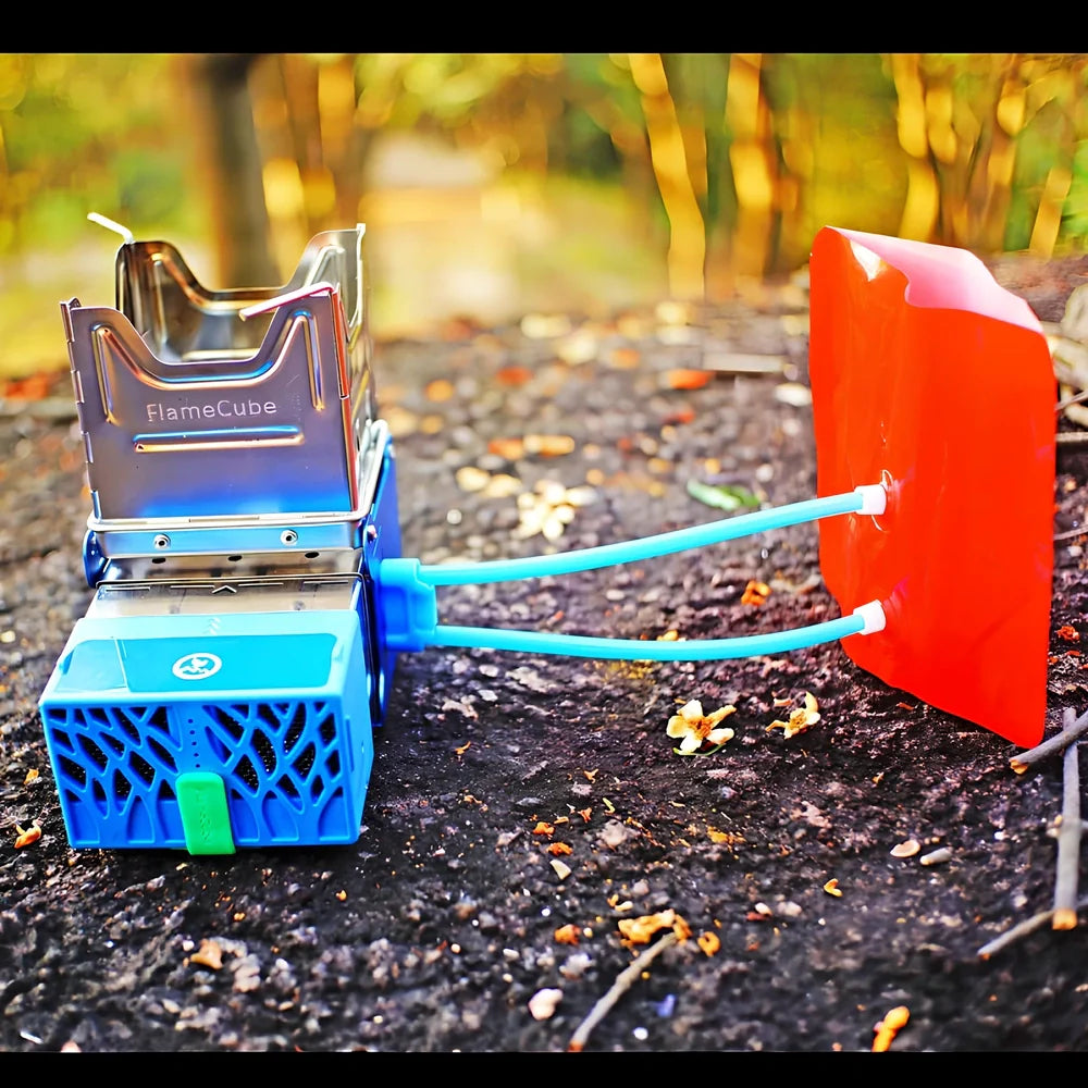 Light blue portable wood-burning camping stove with one-piece furnace body for outdoor cooking