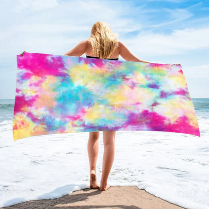 Square beach towel with tie-dye pattern showing superfine fibre texture and vibrant colours