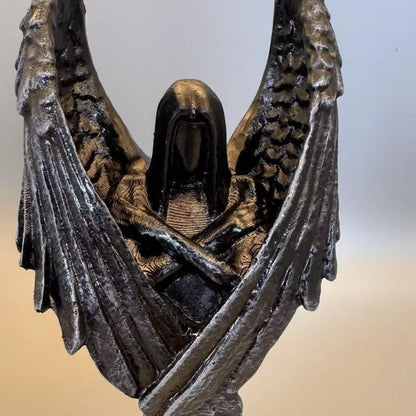 Dark Angel resin statue ornament measuring 6.5 by 5 by 17 centimetres on a wooden surface.