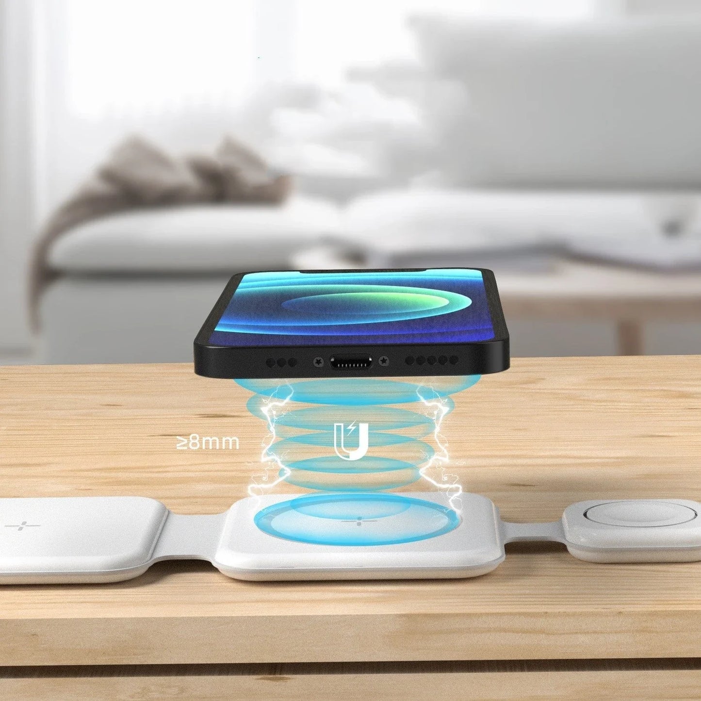 A foldable 3-in-1 wireless charging station with magnetic alignment that can simultaneously charge a phone, smartwatch, and wireless headphones
