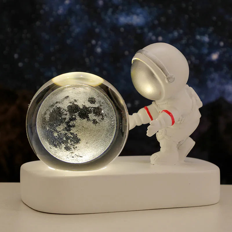 Astronaut crystal ball night light projecting galaxy pattern on 6cm resin sphere with USB cable