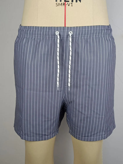 Pair of grey striped polyester shorts with a straight leg cut on a mannequin