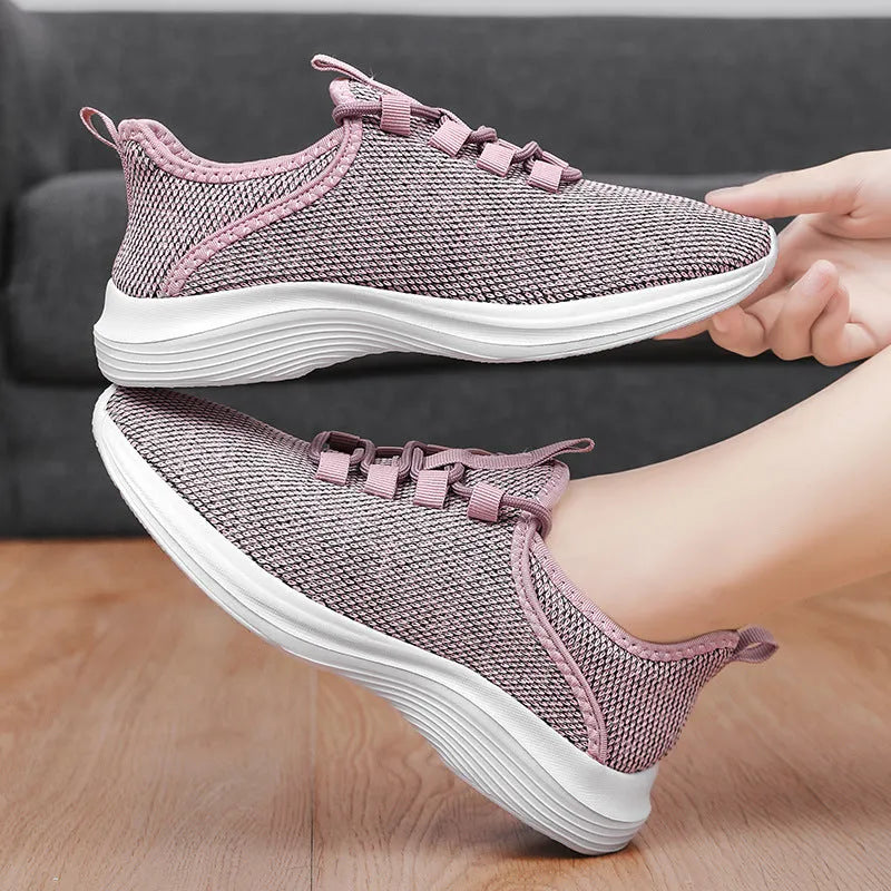 Women's black mesh casual sneaker with lace-up closure and EVA sole