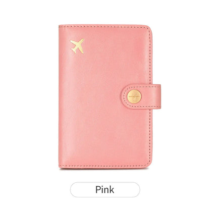 Simple PU leather passport holder in sapphire blue with visible sewing lines, showing card slots and RFID protection.