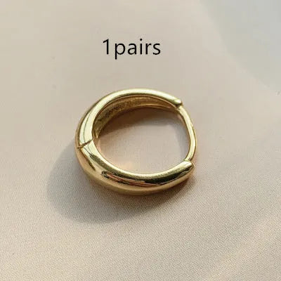 Women's retro minimalist water drop earrings in geometric round shape available in gold or silver colour with three size options