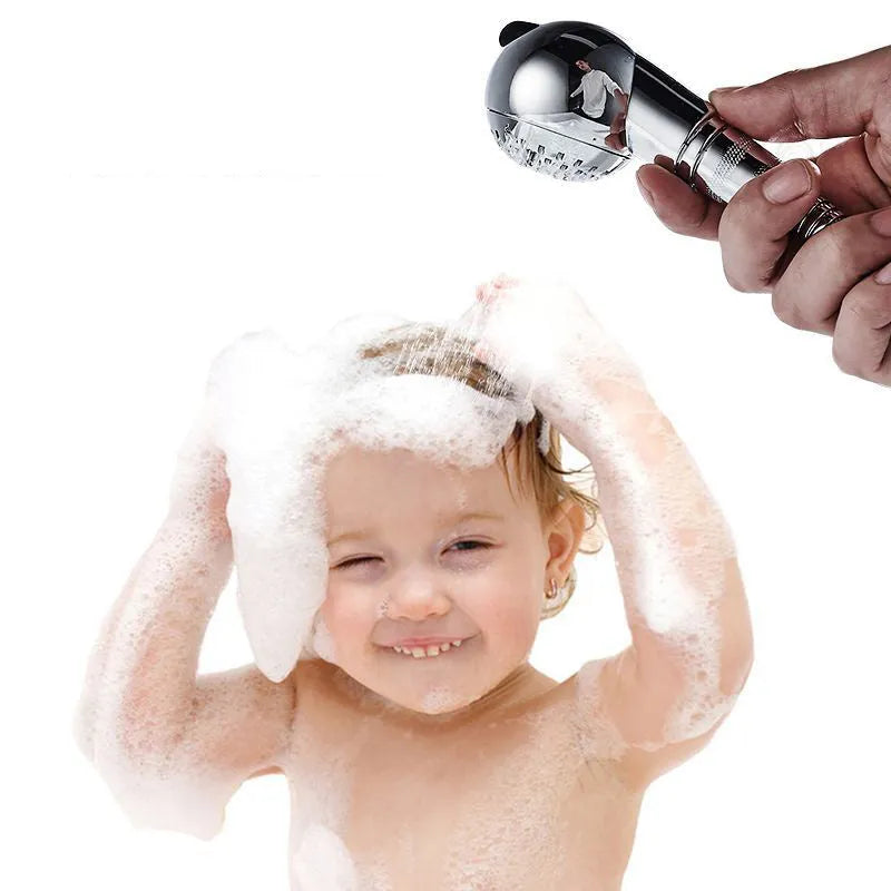 Small silver handheld shower head for gentle washing of pets and babies.