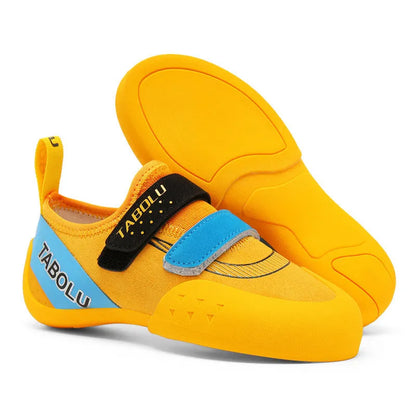 Beginner unisex rock climbing shoes with Velcro straps and a coloured rubber sole.