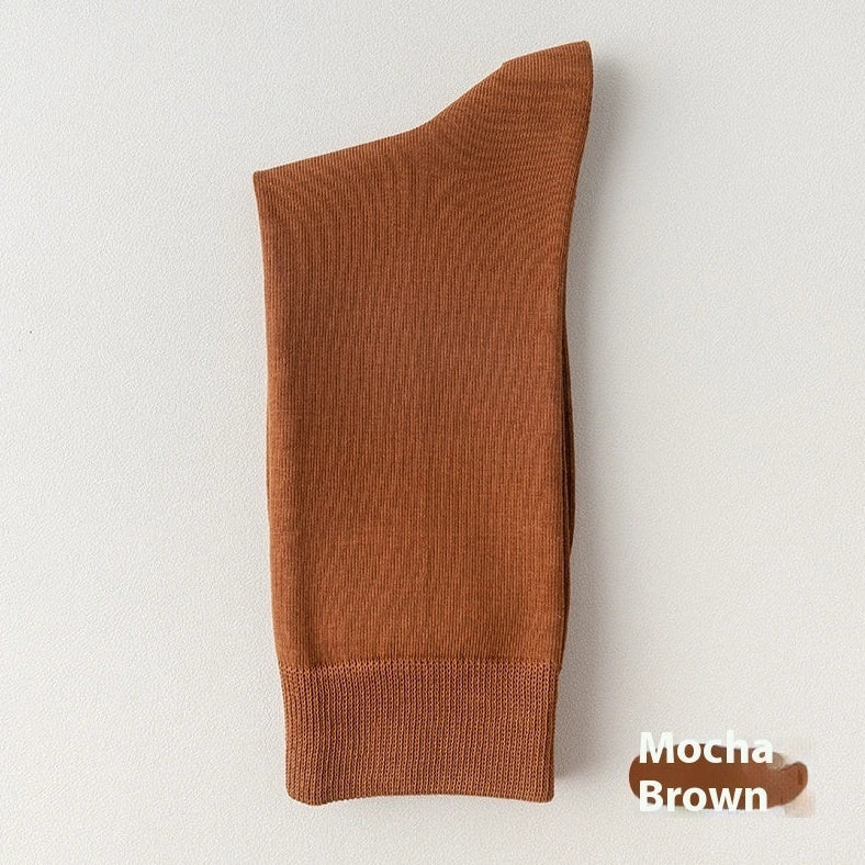 Mid-calf business socks in solid colours with combed cotton construction and deodorant function