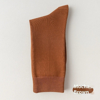 Mid-calf business socks in solid colours with combed cotton construction and deodorant function