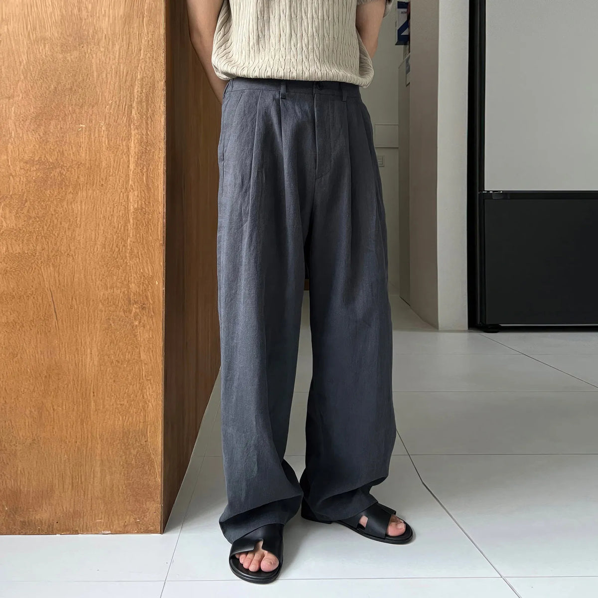 Army Green men's linen-style leisure trousers with a drawstring waist, laid flat.