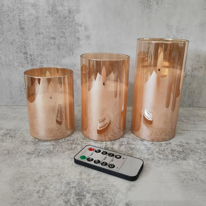 Electroplated glass LED electronic candle with gold finish and realistic flame simulation