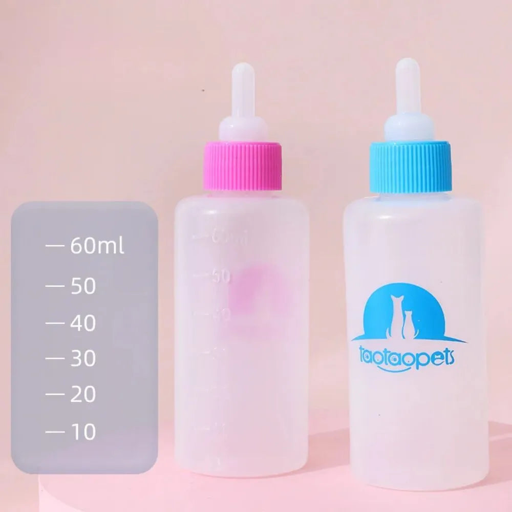 Four pet milk bottles in blue, green, pink and yellow colours with cleaning brush for small animal feeding
