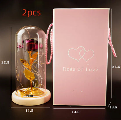 Little Prince rose arrangement under 20x9cm glass dome with gold foil flowers