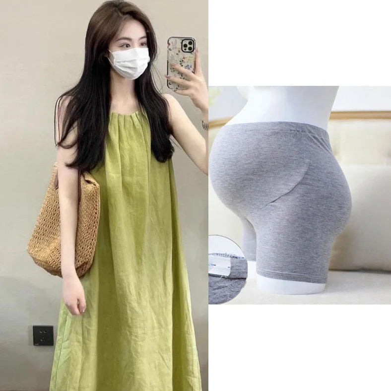 Plus size asymmetric sleeveless vest skirt in green with matching trousers