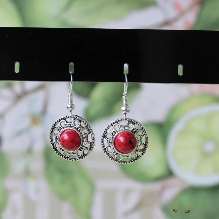 Handmade Miao silver retro turquoise flower disk earrings with geometric totem patterns