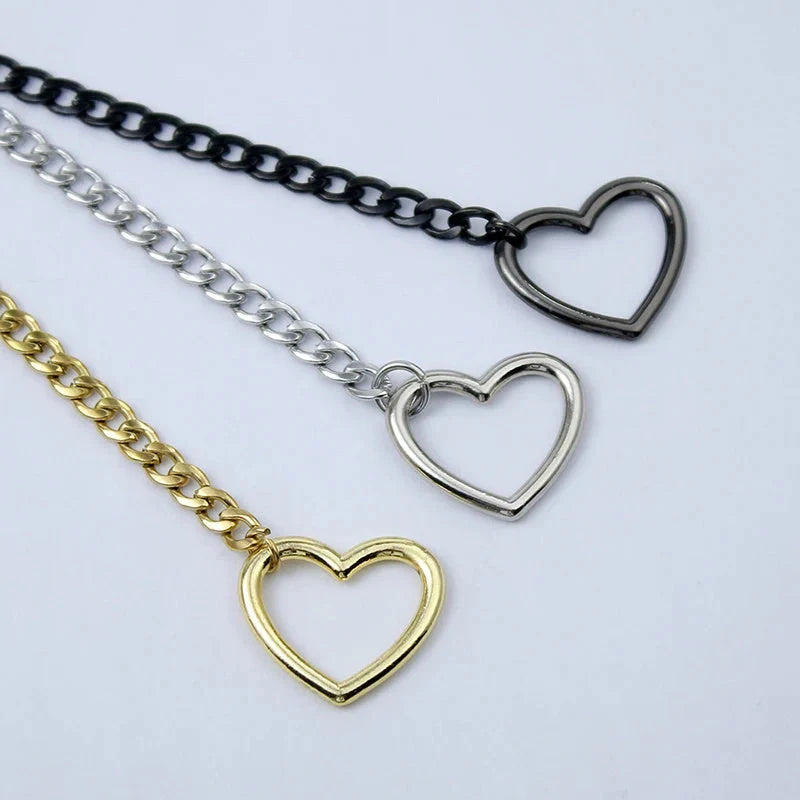 Adjustable heart-shaped O-ring slip chain necklace in black, silver, and gold