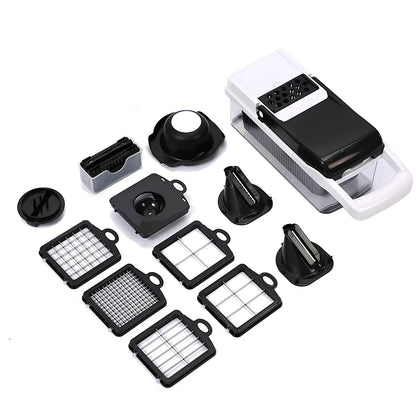 Multipurpose vegetable cutter with seven blades, drain basket and accessories on kitchen counter