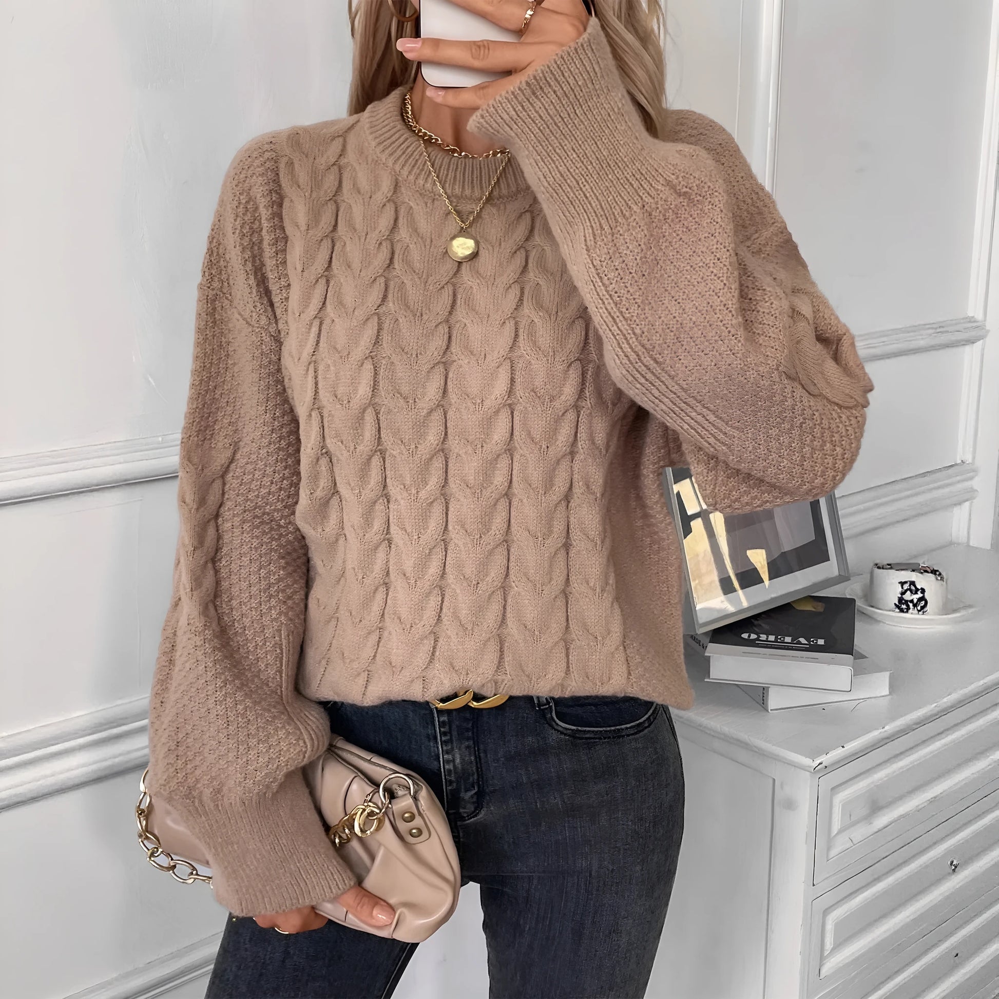 Women's round neck sweater with twist design in solid colour polyester fabric