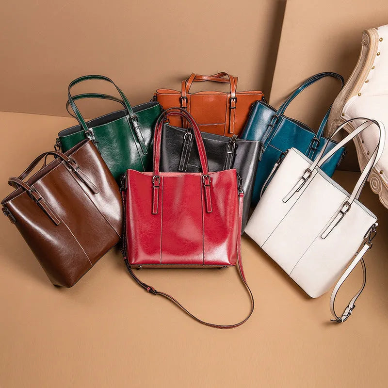Brown genuine leather women's retro shoulder bag showing front view and organised interior pockets.