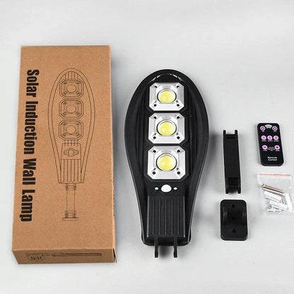 Solar street LED light with 55cm housing, white illumination, and remote control for outdoor garden security