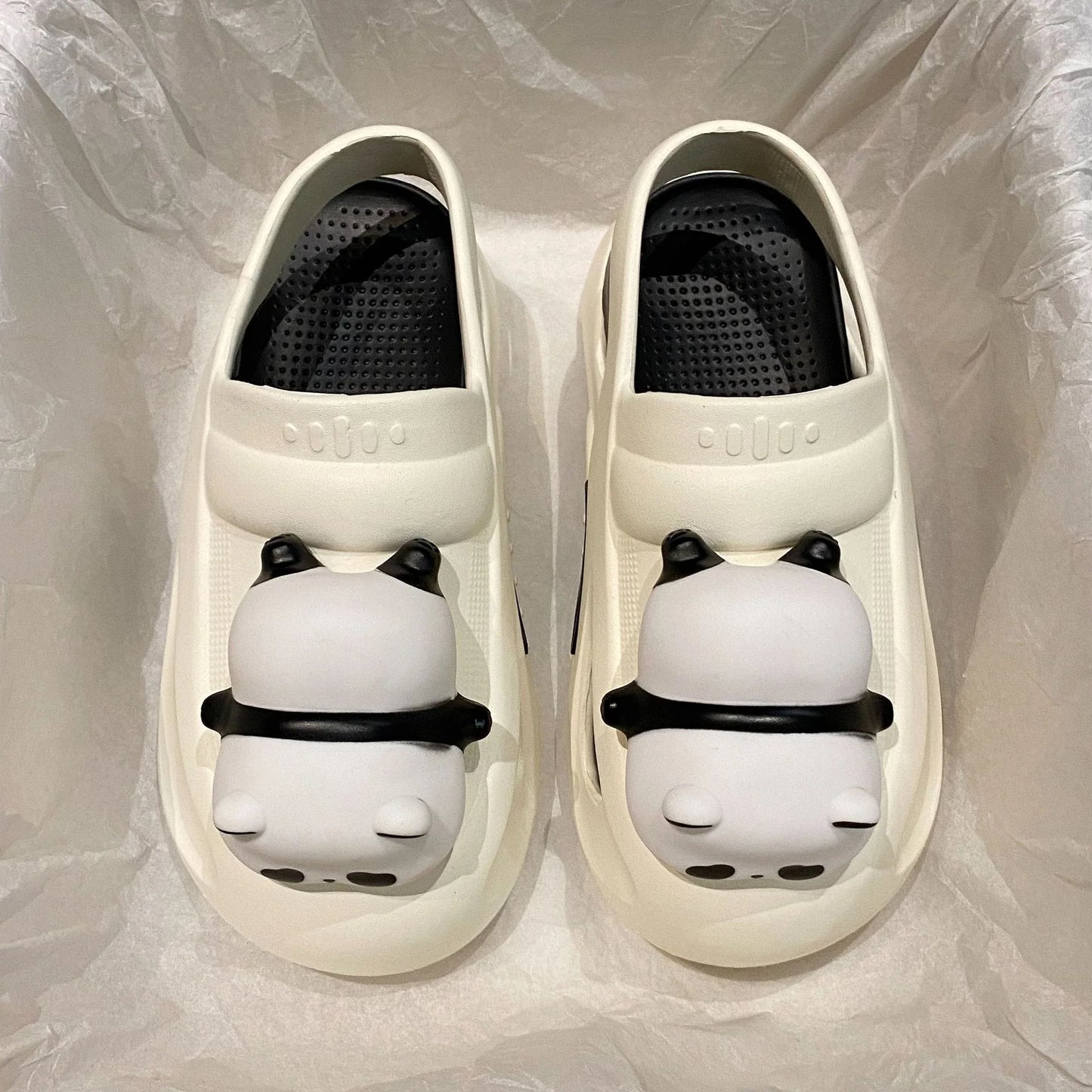 Cozy Panda Night Light Slippers with a charming panda design, built-in night light, and comfortable EVA construction