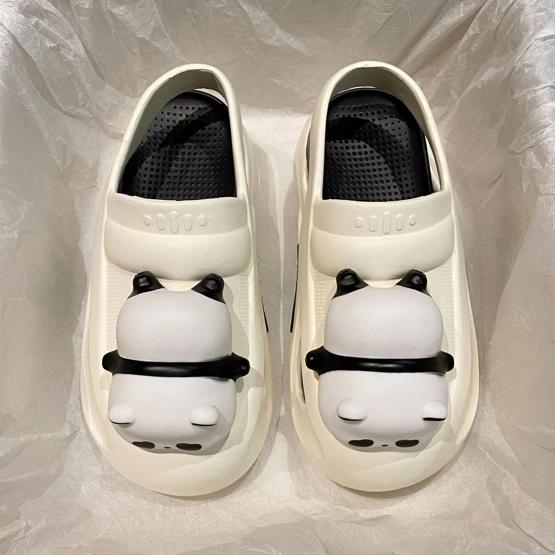 Cozy Panda Night Light Slippers with a charming panda design, built-in night light, and comfortable EVA construction