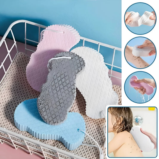 White 3D fish scale pattern exfoliating bath sponge ball hanging on a hook.