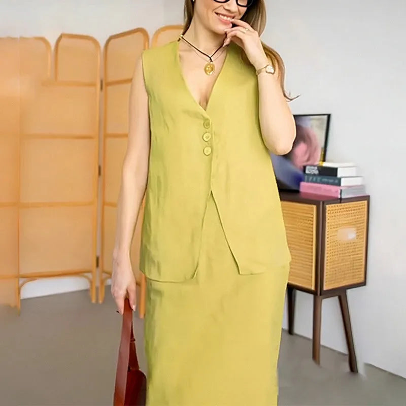 Women's casual two-piece suit with sleeveless vest and long skirt in blue colour, showing loose fit design