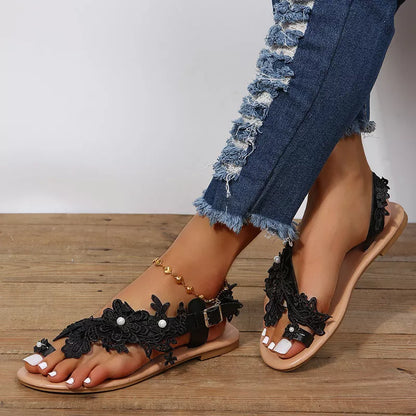 Bohemian lace sandals with floral ankle strap in white and black