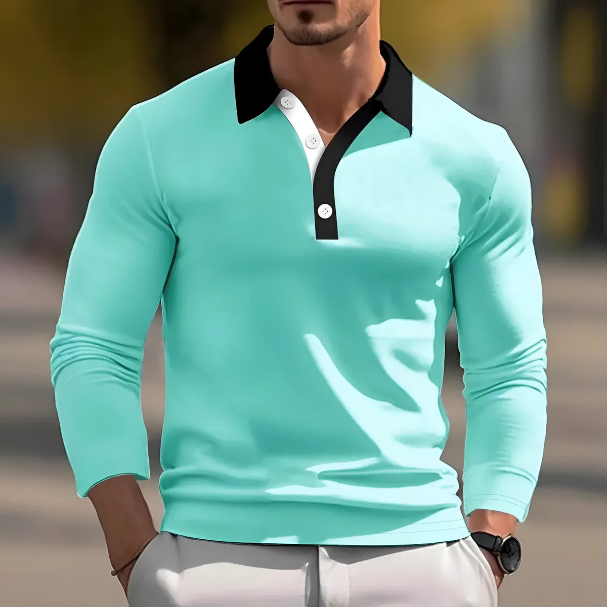 Men's long sleeve button-up polo shirt in a loose fit, made from a polyester blend fabric.