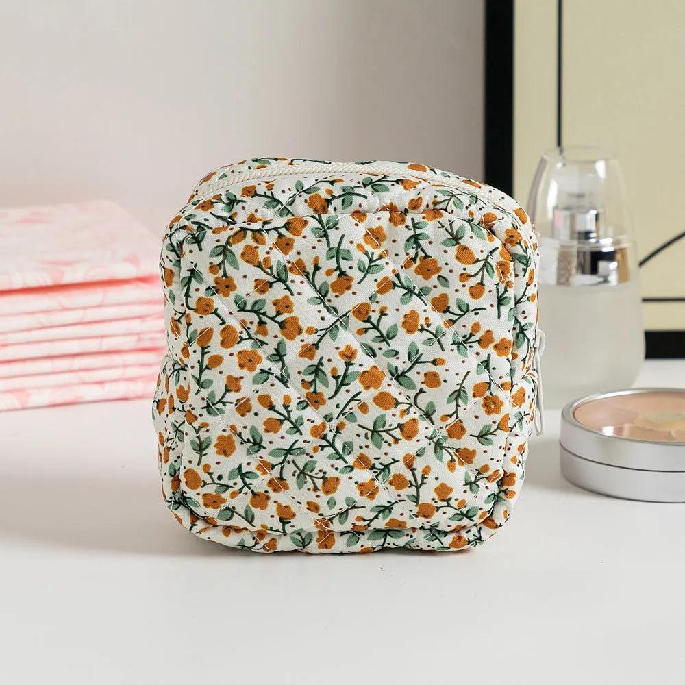 Women's key storage bag with floral patterns including cherry on white background design