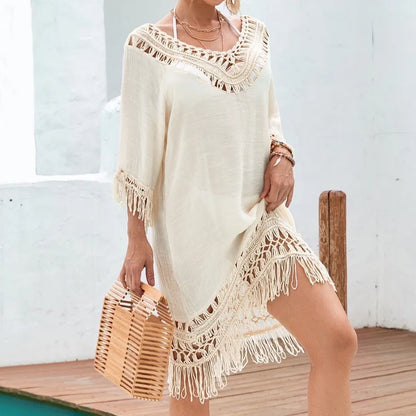 Apricot crocheted knitted patchwork beach dress with mid-length skirt and half sleeves on hanger
