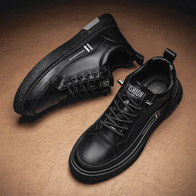 Men's low-top black and white skateboard shoes with elastic band and rubber sole.