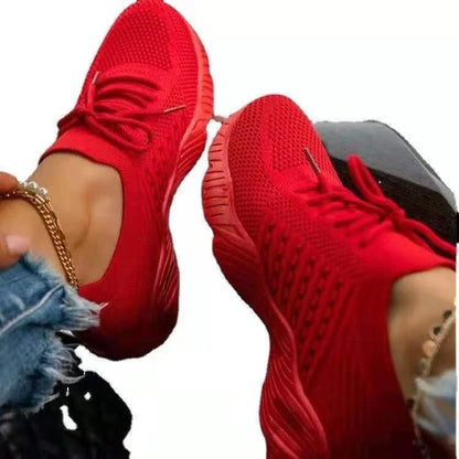 Stylish knit sneakers in various colors for active women, featuring a lightweight, breathable, and comfortable design.