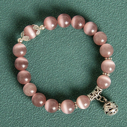 10MM Hollow Ball Korean Style Crystal Opal Beaded Bracelet in black, purple, white, pink, and green