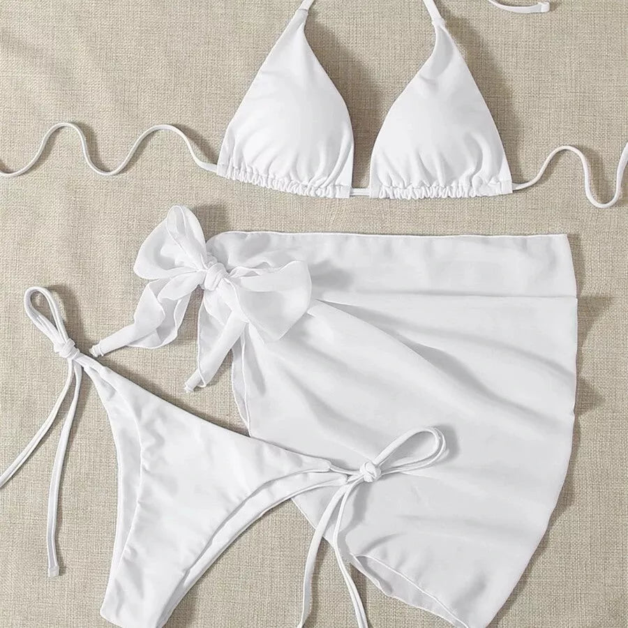 Women's three-piece mesh bikini swimsuit in vibrant colors, featuring a top, shorts, and skirt for versatile beachwear.