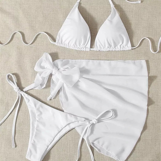 Women's three-piece mesh bikini swimsuit in vibrant colors, featuring a top, shorts, and skirt for versatile beachwear.