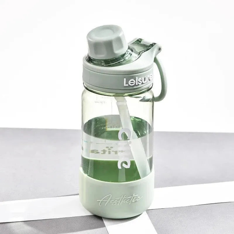 Grey portable plastic cup with built-in straw, shown in 1000ml size with modern cylindrical design.