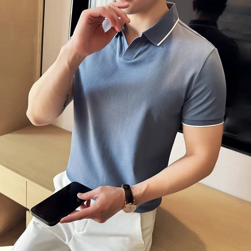 Men's short sleeve lapel polo shirt in a cotton blend fabric shown in solid colour options.