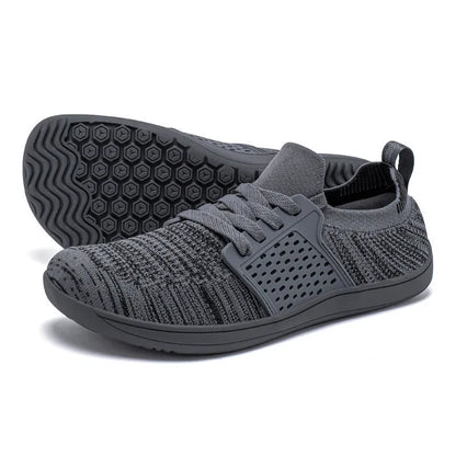 Men's black brown mesh and synthetic leather walking shoes with soft sole and wide toe design.