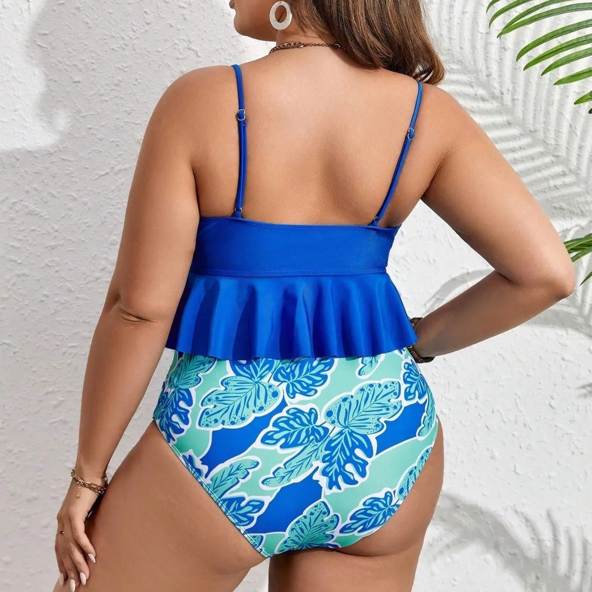 Blue plus-size bikini set with briefs-style bottom, shown on a mannequin.