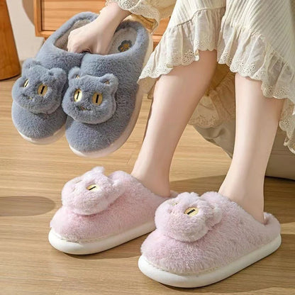 Cozy cat-themed plush slippers with soft, plush fabric and memory foam insoles for comfortable all-day wear