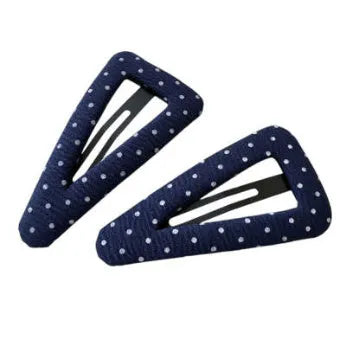 French retro dot pattern barrettes in triangle and water drop shapes with dark denim styling
