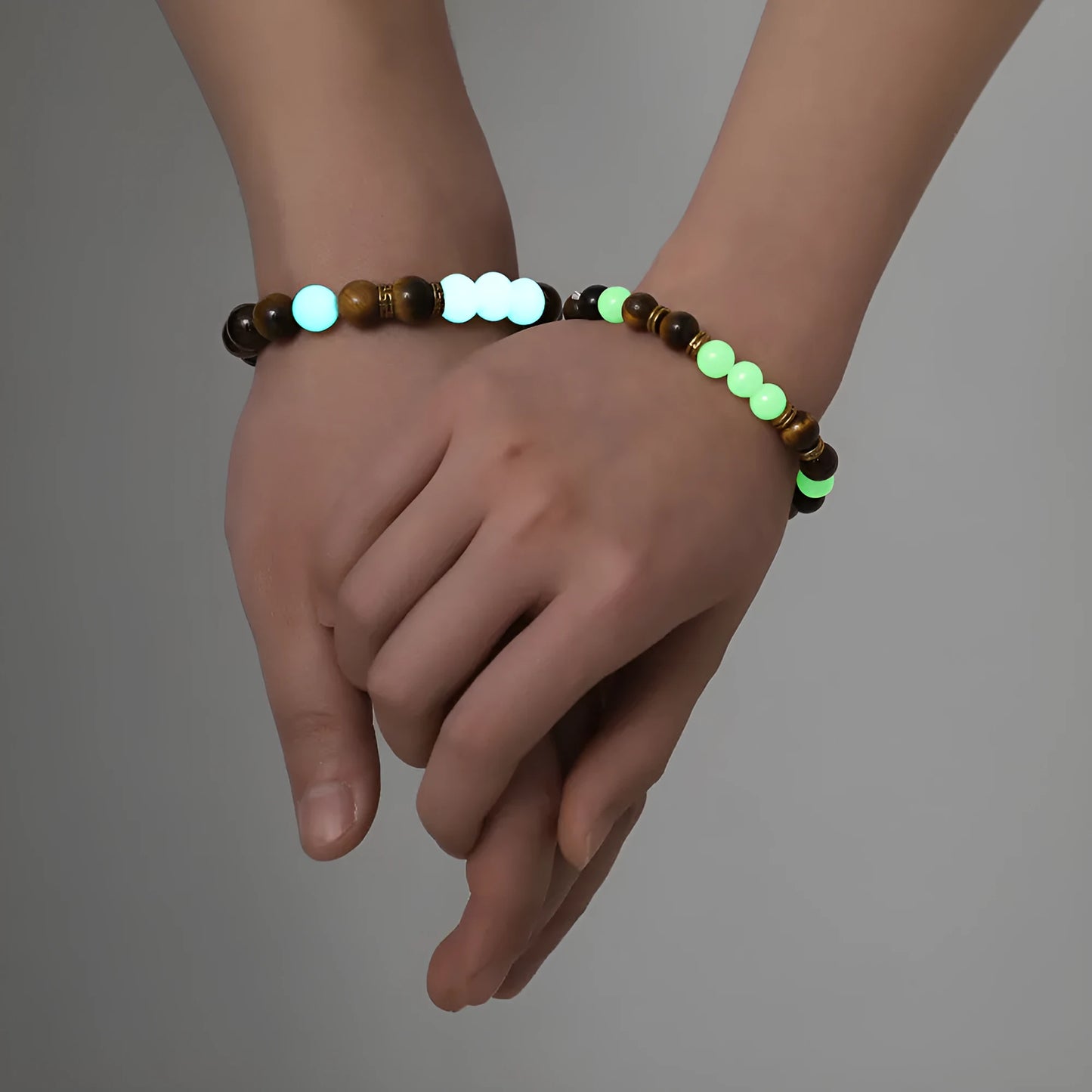 Amber geometric couple bracelets with luminous elements and retro patterning