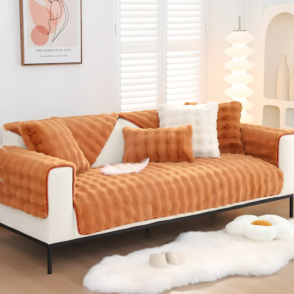 Square flannelette sofa cushion in light blue colour measuring 110x160cm on grey fabric sofa